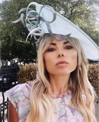 Model with makeup brushes